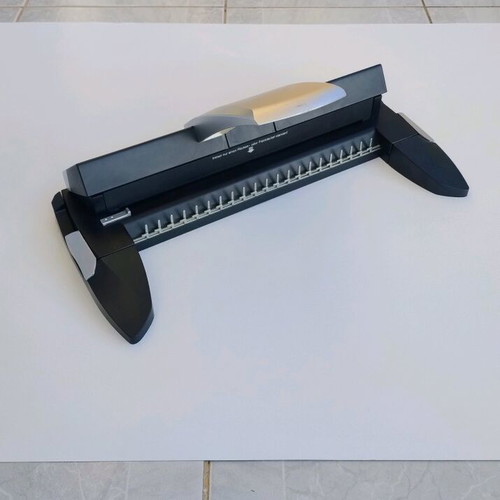 MP700 Binding Machine like new with spiral binding materials