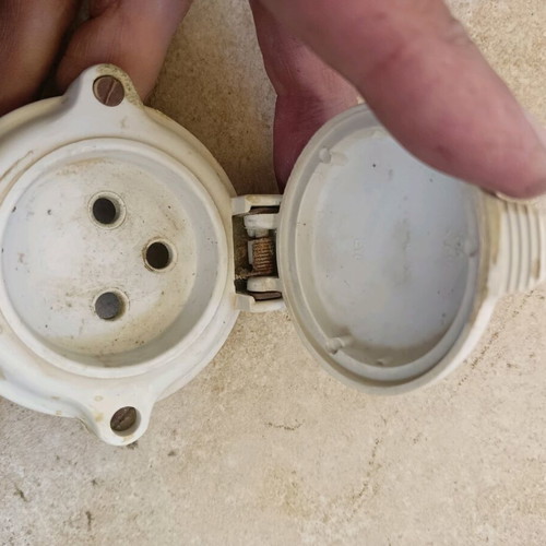 Old socket frame used with spring-loaded reset cover