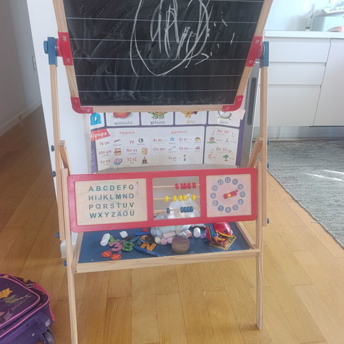 Double-sided educational board with magnetic and blackboard sides