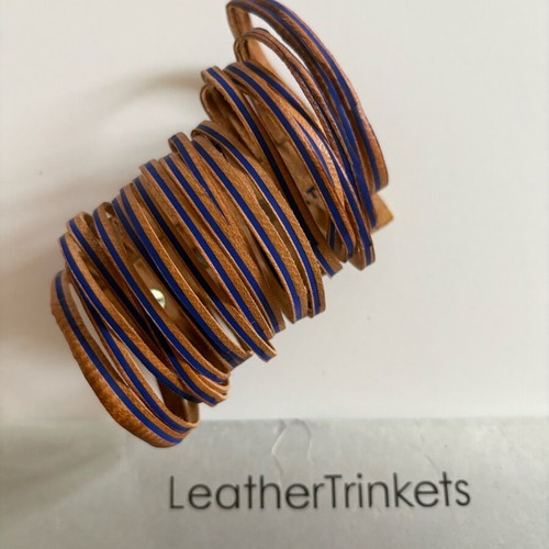 Leather bracelet used brown with blue details