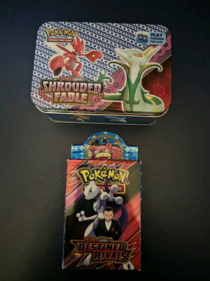 Pokemon cards like new, non-authentic with metal tin and extra cards