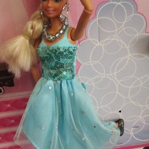 Vintage Barbie doll with handmade shoes and accessories