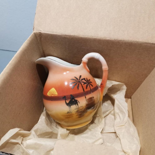 Porcelaine de Japon jug used with bamboo handle