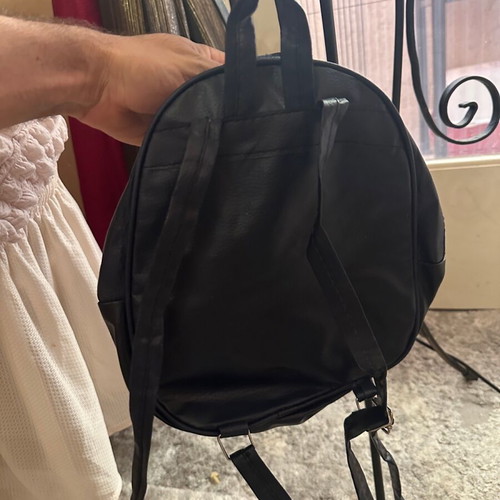 Mini backpack black leatherette with metal studs like new