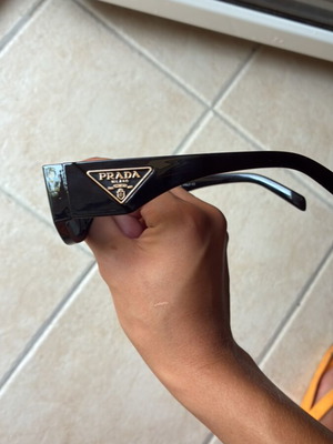 Prada sunglasses in excellent condition, black