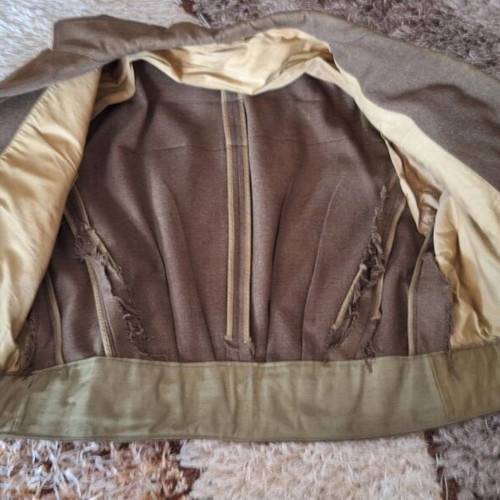 Vintage military jacket used with minor wear