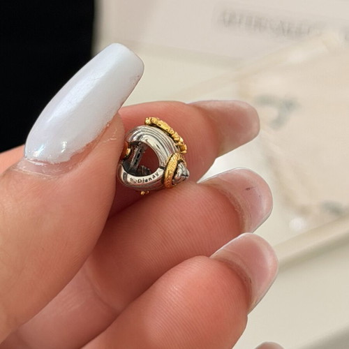 Pandora Ariel shell charm with diamond symbol