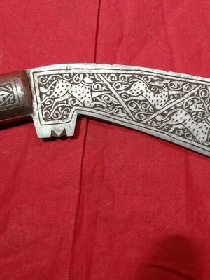 Decorative Kukri Knife like new, hand-carved with wooden handle and sheath
