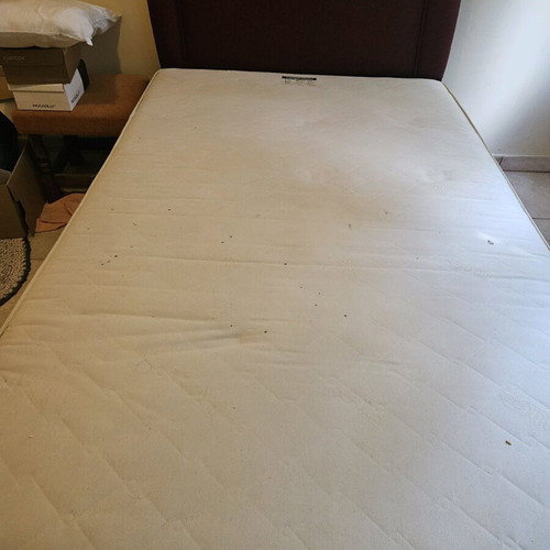 Semi-double bed with mattress used lightly