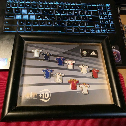 Set of collectible pins with Adidas jerseys like new