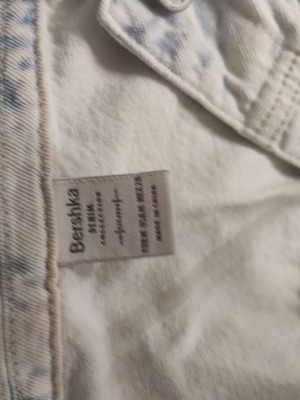 Bershka sleeveless short denim jacket like new, blue with rips and embroidery