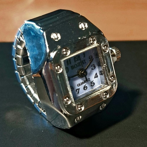 Ring watch quartz with purple dial and silver bracelet like new