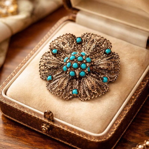 Vintage silver brooch used with turquoise stones