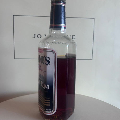Lamb’s Navy Rum like new with hexagonal bottle