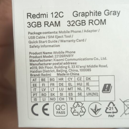 Redmi 12C smartphone used with gift headphones, dual SIM, 32GB