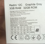 Redmi 12C smartphone used with gift headphones, dual SIM, 32GB