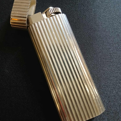 Cartier lighter used silver with vertical grooves