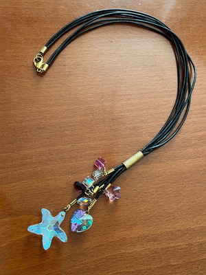 Black necklace with stones and leather cord like new