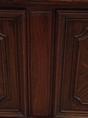 Vintage wooden buffet with carved doors and metal handles like new