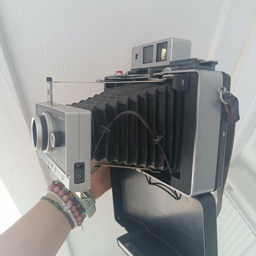 Polaroid Automatic 450 Land Camera like new, folding with glass lens