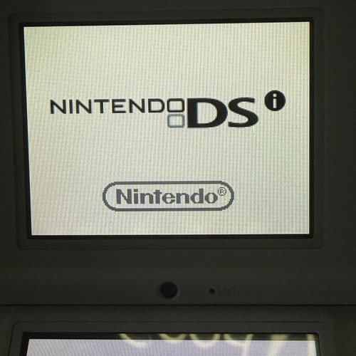Nintendo DSi used with 1 game and 1 charger