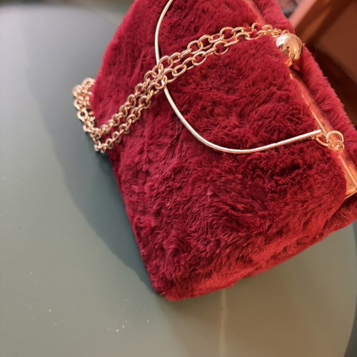 Women's red furry wallet with gold clasp like new