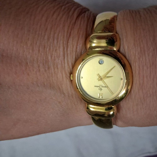Laurent Dodane women's watch like new, gold color