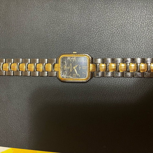 Watch used gray and gold