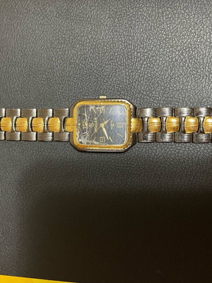 Watch used gray and gold