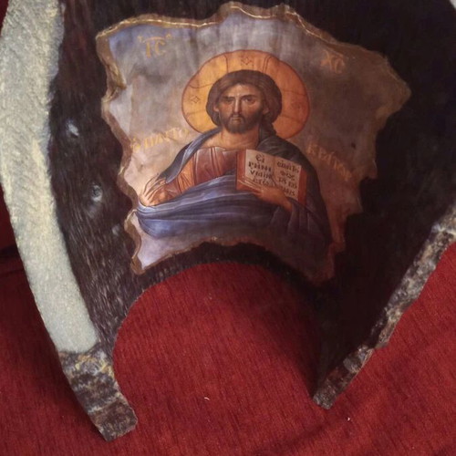 Christ image on tree trunk like new