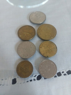 Set of 7 Greek drachma coins used, including commemorative 500 drachmas