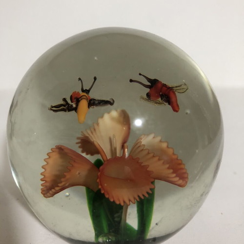 Handblown glass dome paperweight with stylized bees