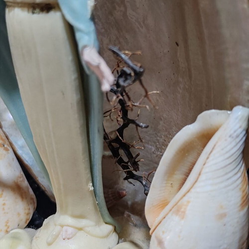 Handmade Virgin Mary statue with natural seashells