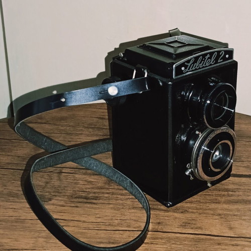 Lubitel 2 vintage camera with leather case and strap