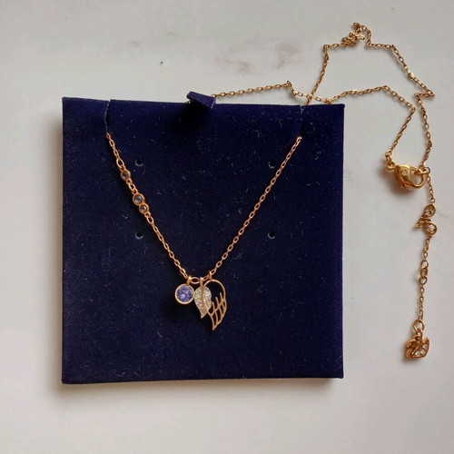 Swarovski necklace in rose gold, like new