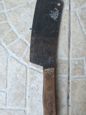 Vintage butcher cleaver with wooden handle
