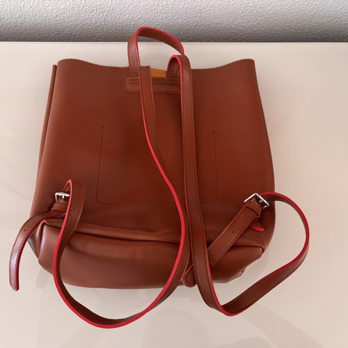 Nolah Backpack like new, brown with yellow strap