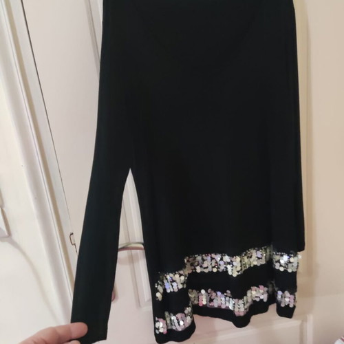 Women's black blouse slightly used with small tear, size L