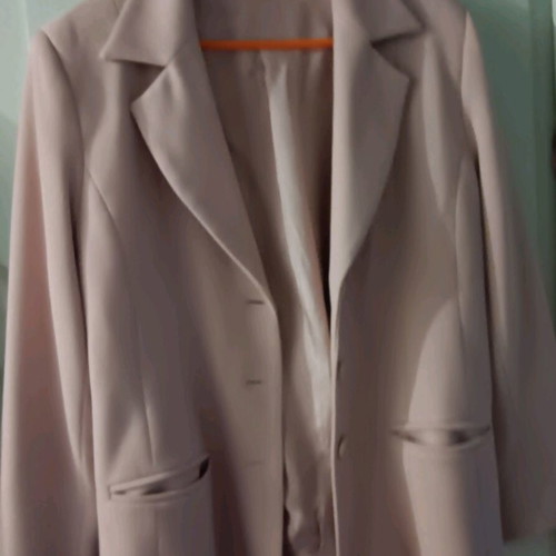 Kanellis Collection soft pink jacket used with wear