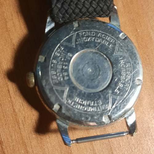 Two vintage wind-up watches and one bamboo watch used