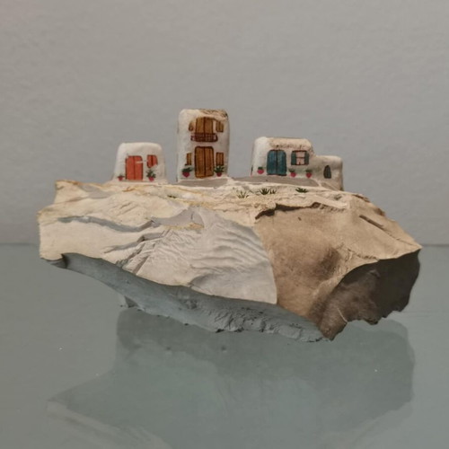 Handmade souvenir used on natural volcanic stone
