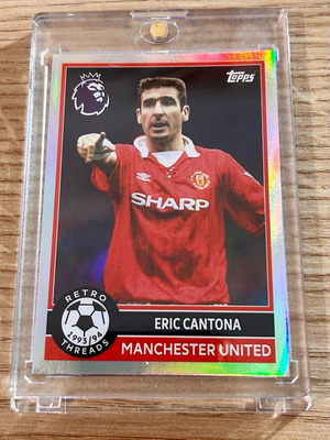 Eric Cantona Manchester United Topps 2025/26 card in acrylic case