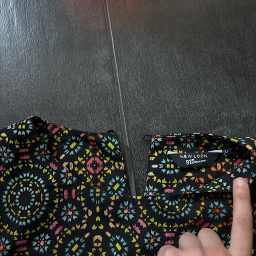 Black short-sleeve dress like new with colorful boho geometric pattern