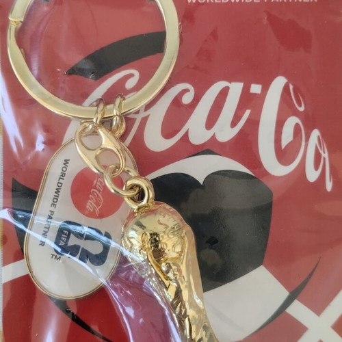 FIFA 2026 World Cup Keychain new from Coca Cola with winner's trophy