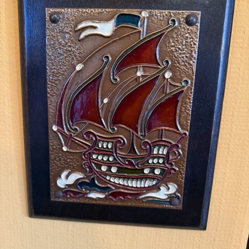 Embossed copper decorative ship on wooden base like new
