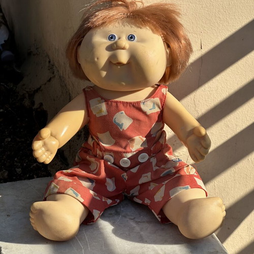 Vintage Cabbage Patch Kids doll used with clothes