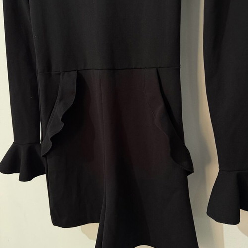 Zara one-piece shortsuit used, black with ruffles and open back