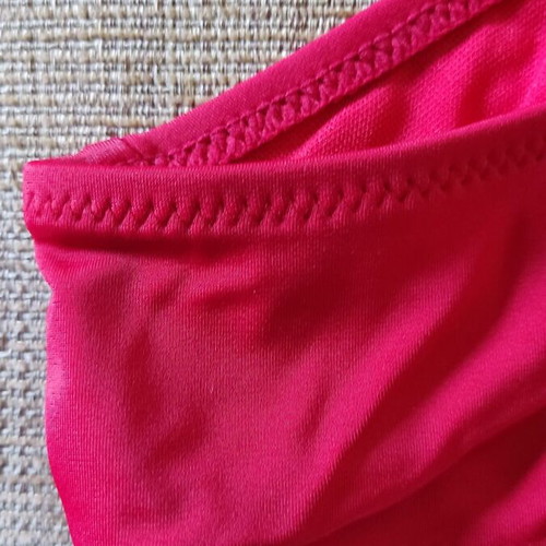 Red swimsuit size 50 like new, side tie