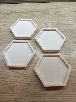 White gypsum polygonal coasters set of 4 like new