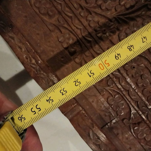 Carved wooden tray used with brass inlay